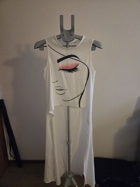 White Sleeveless Droptail Shirt with Artistic Face Print